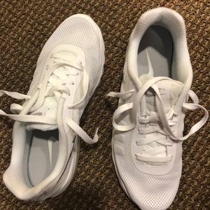 White Nike tennis shoes